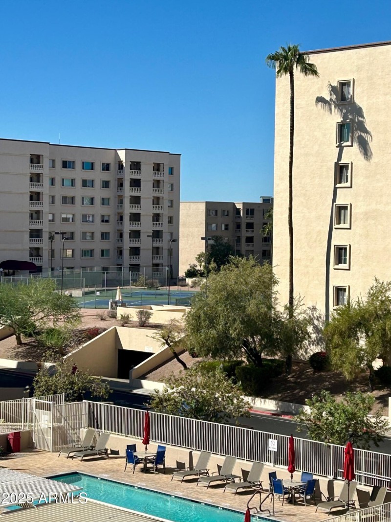 Balcony View Pool & Tennis Court