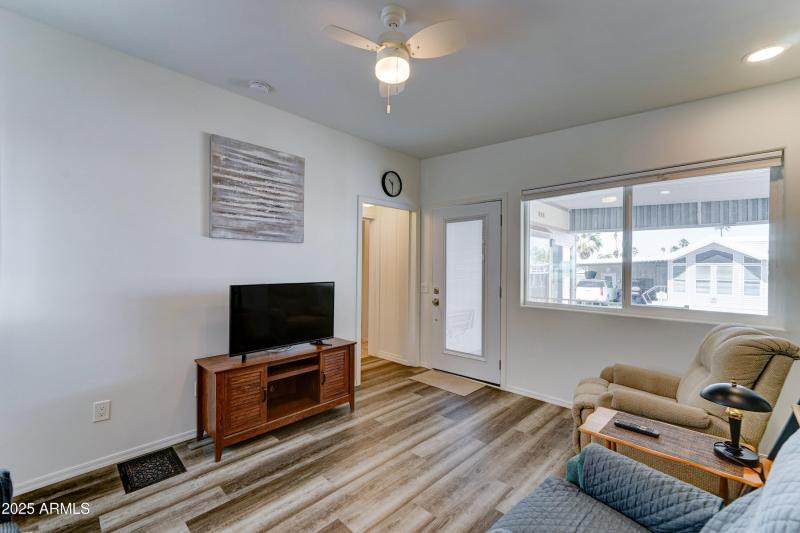 Inside the window blinds on front door