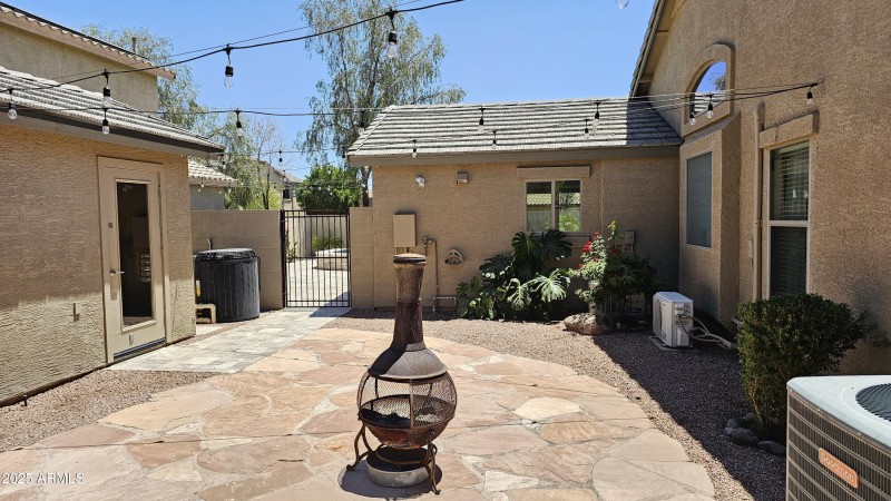 Patio side yard with site built shed