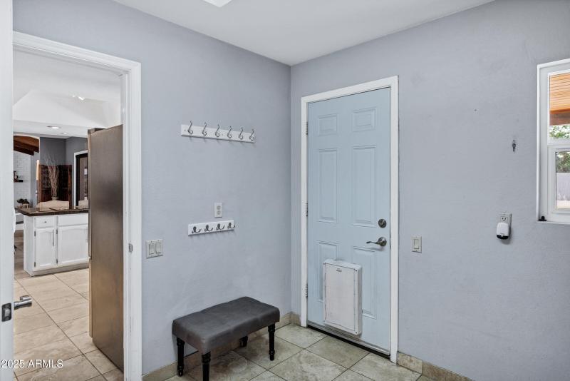 Laundry Room w/ an Exit to the Patio