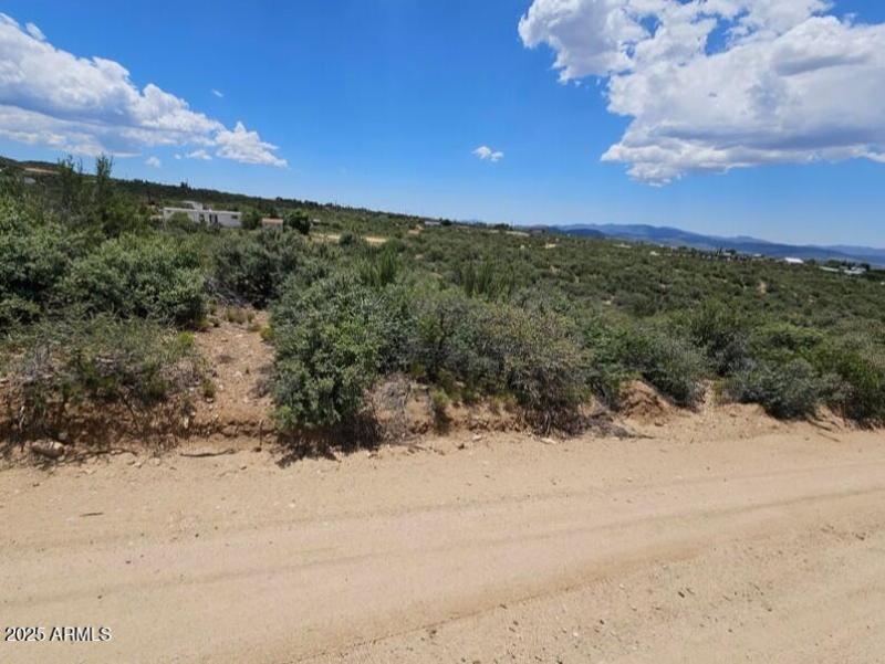 1/2 mi on dirt road to Property