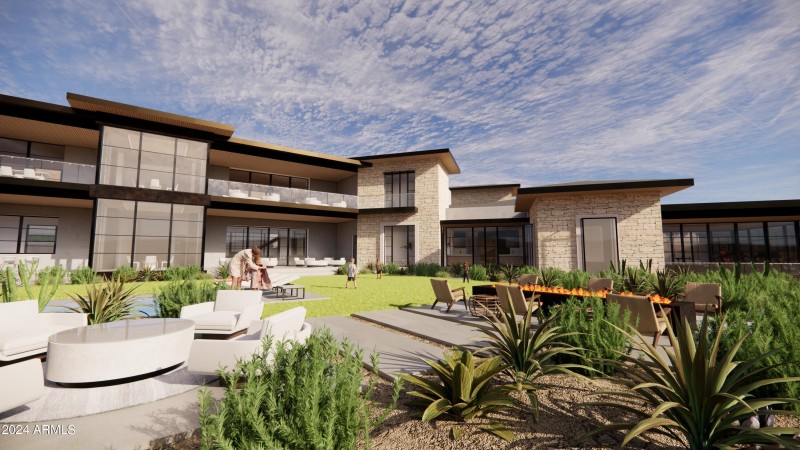 EXTERIOR - VIEW OVER FIREPIT TO HOUSE