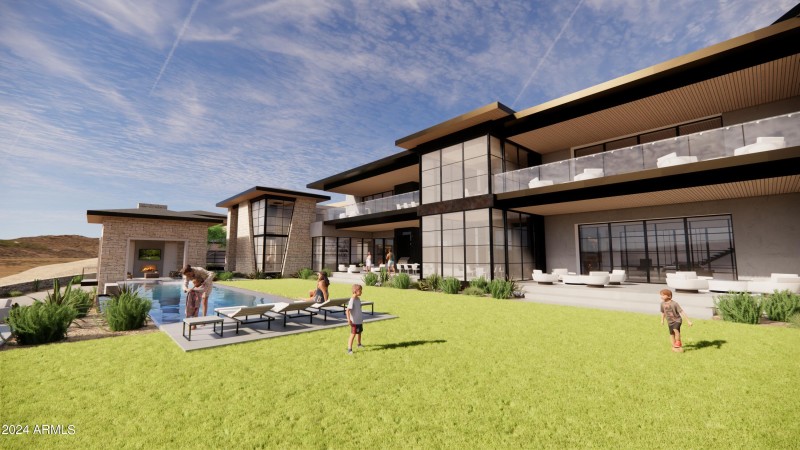 EXTERIOR VIEW OVER GRASS TO HOUSE