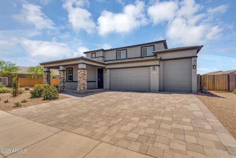Full-Height Stone Columns and RV Garage