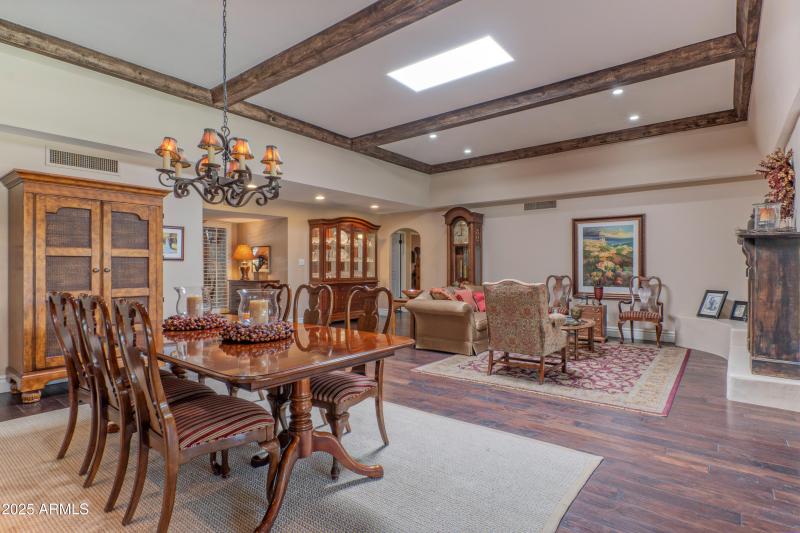 Living/dining soaring beamed ceiling