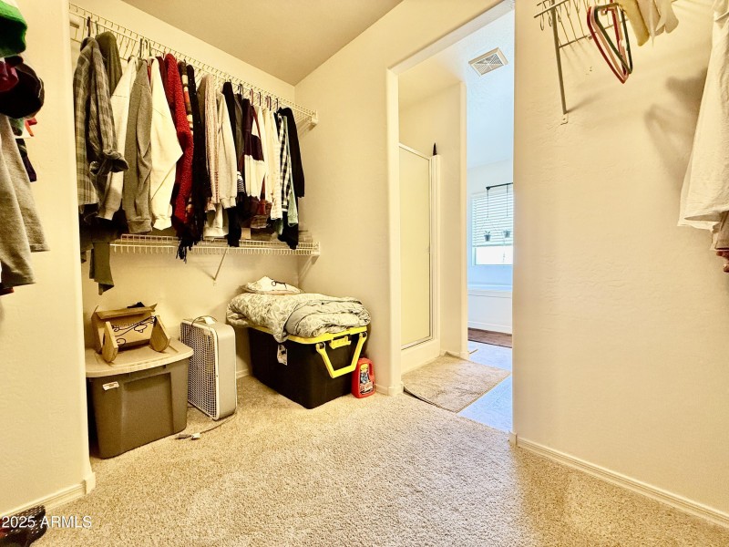 Upstairs Primary Suite Walk-In Closet