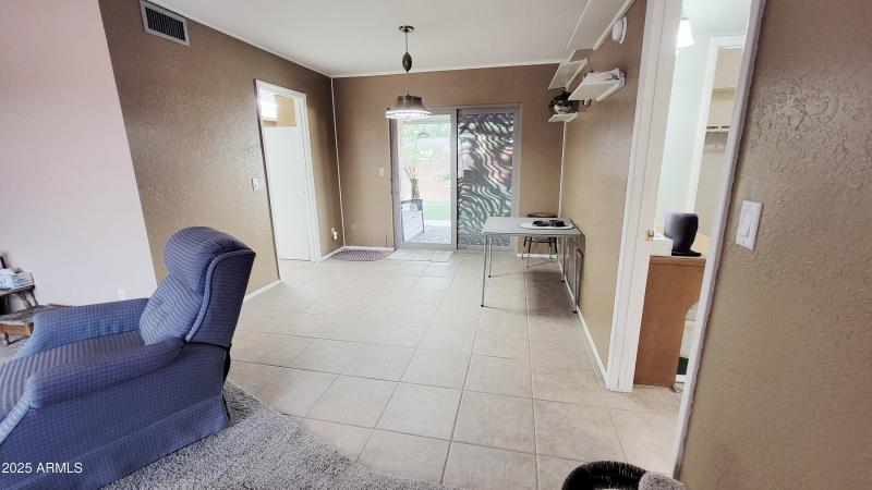 Dining with Exit to Back Yard