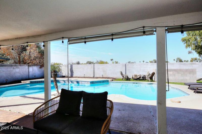 Patio overlooking private pool