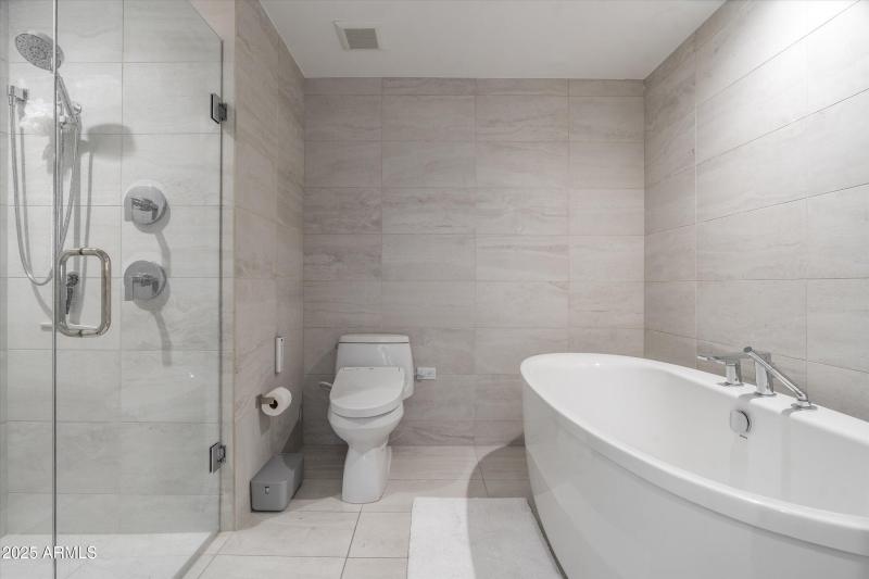 Wall to Ceiling Tile & Glass Shower