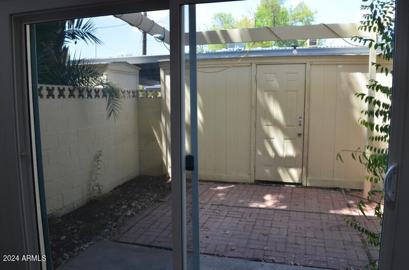 Gated yard and locked shed
