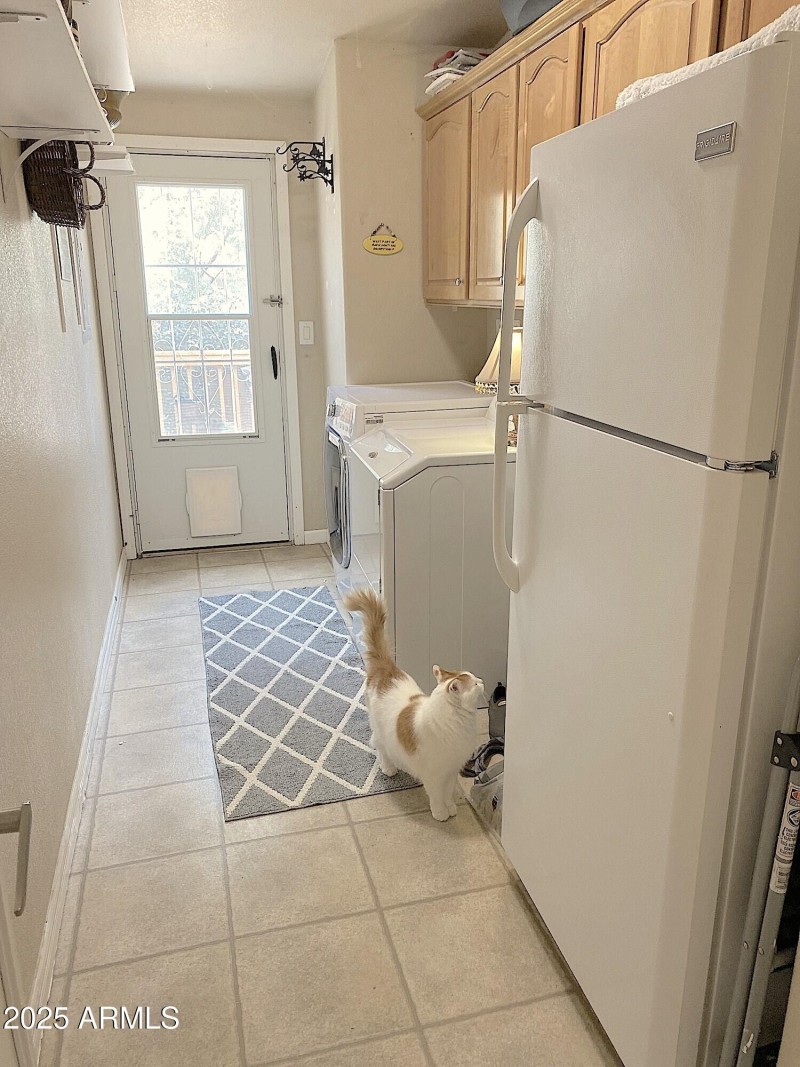 Laundry w/cabinets & addt'l fridge!(1)