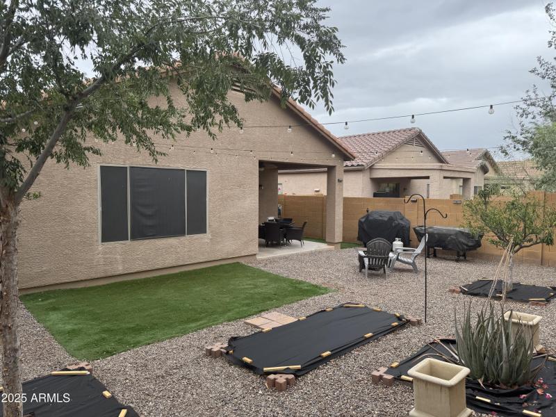 Backyard with synthetic grass