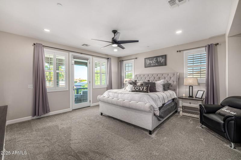 PRIMARY BEDROOM WITH BALCONY ACCESS