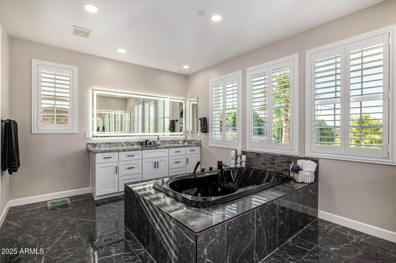 LARGE WINDOWS IN PRIMARY BATH