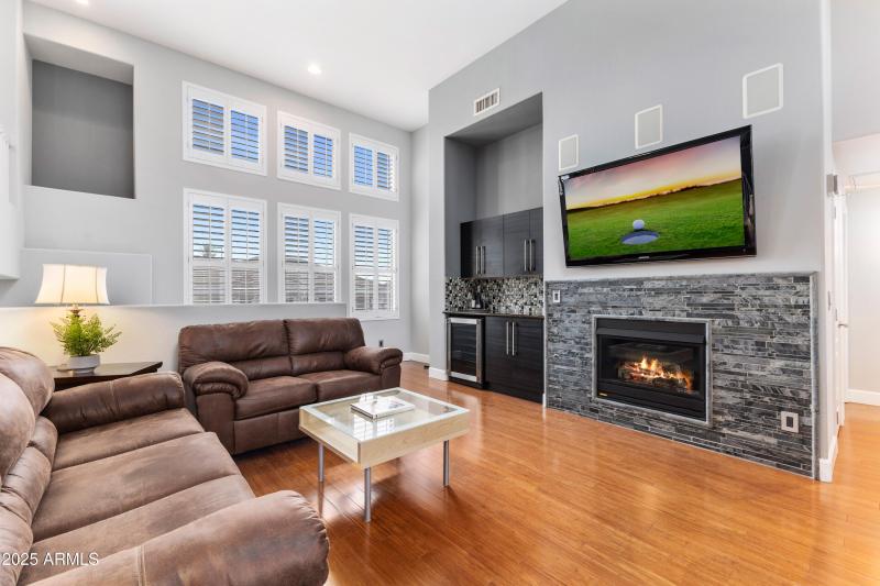 Great Room with Custom Fireplace and Bar