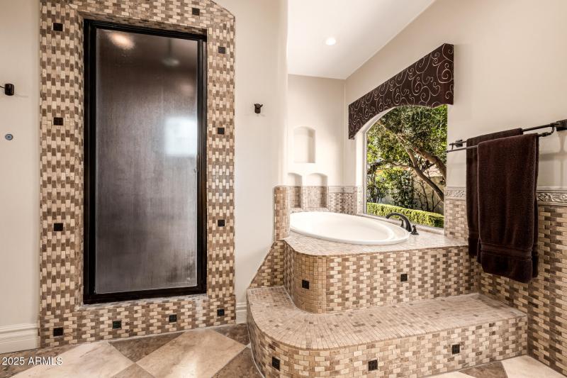 Walk in shower and separate soaking tub