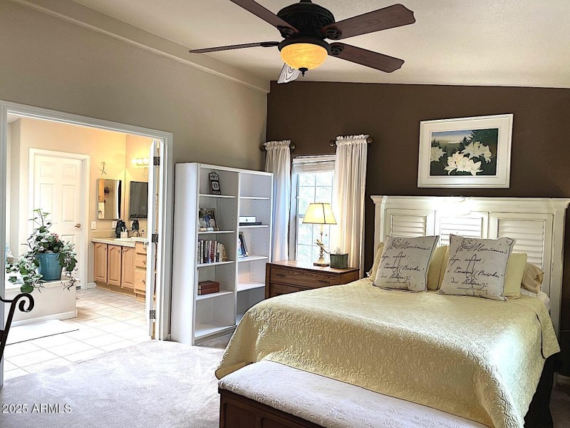 Double doors to bath & vaulted ceilings