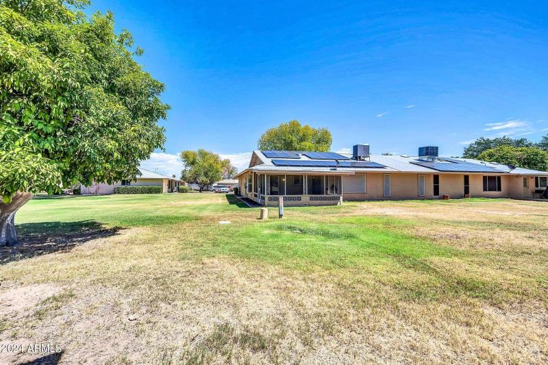 Large grass area behind home - 103rd