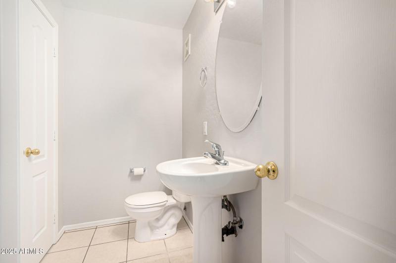 Downstairs Half Bath and Storage