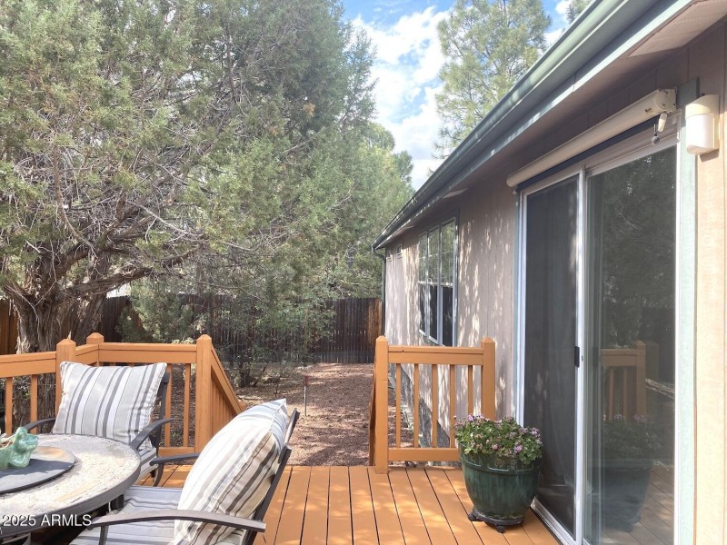 Dual pane sliding glass doors to deck