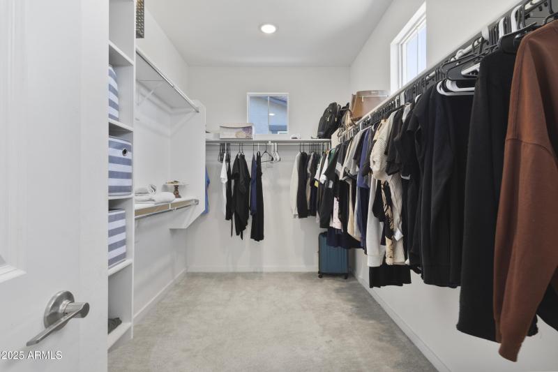 Primary walk-in closet.