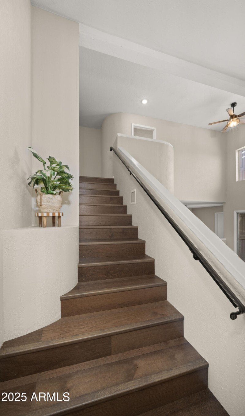 Staircase w/ New Flooring Upstairs