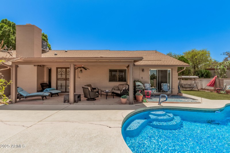 Watch the golfers from your backyard