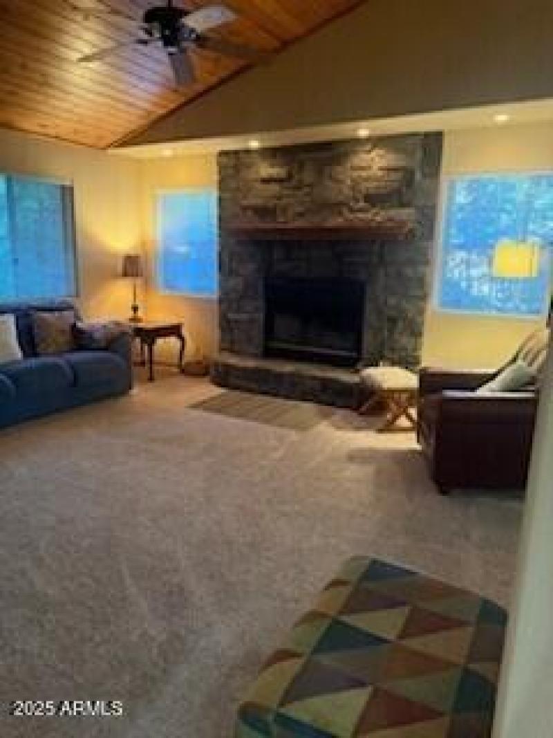 Living Room w Stone Fireplace