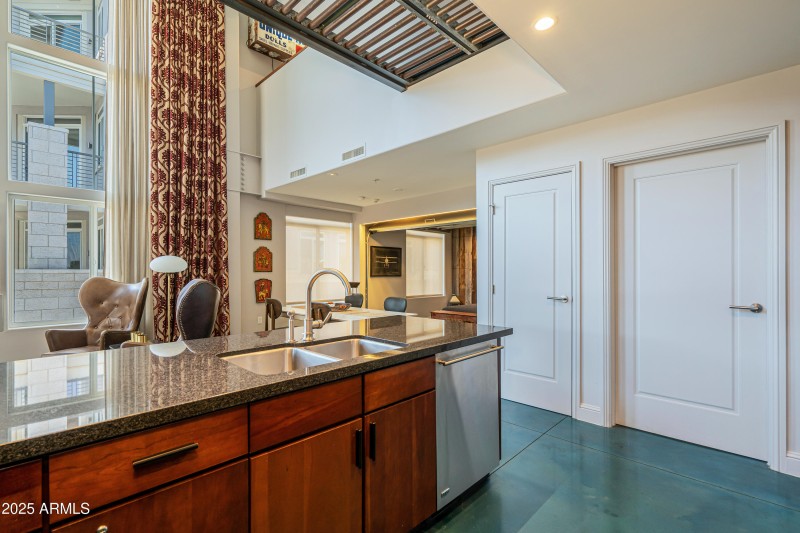 Doors to pantry and laundry