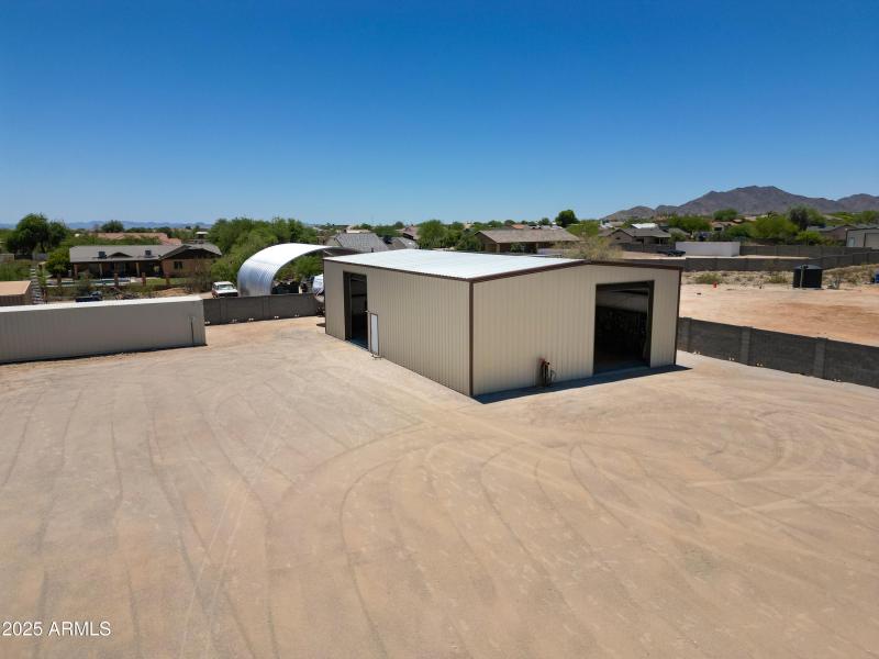 Gated RV Garage & Open Pad