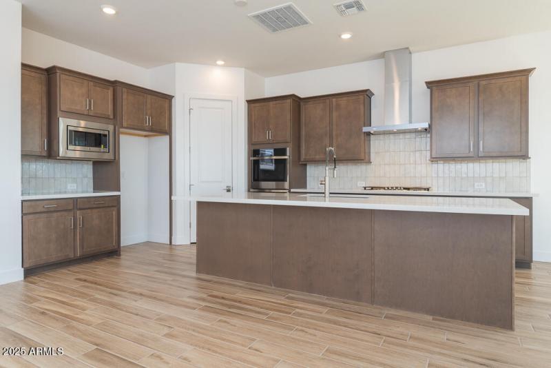 Tri Pointe Blossom Rock 490 - Kitchen-1M