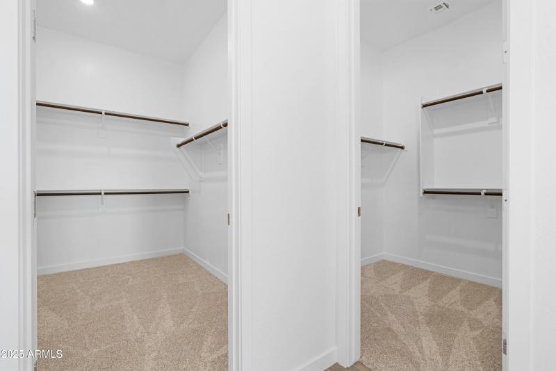 Dual Master Walk In Closets