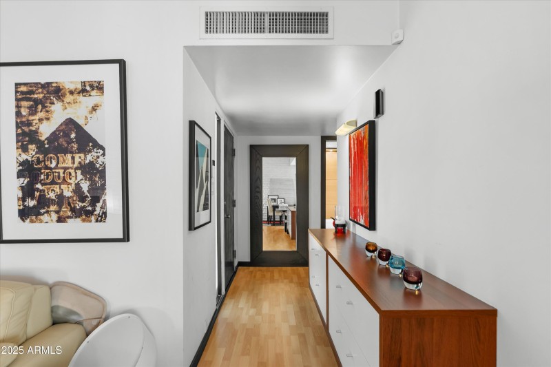 Entryway opens to the living room.