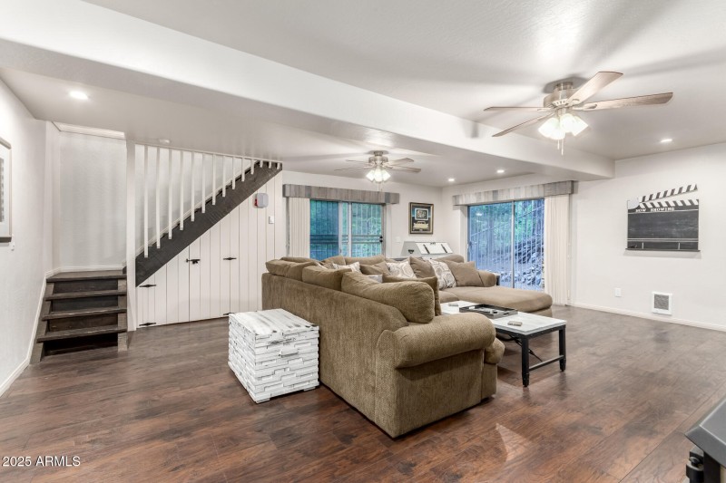 Living room leads to upstairs