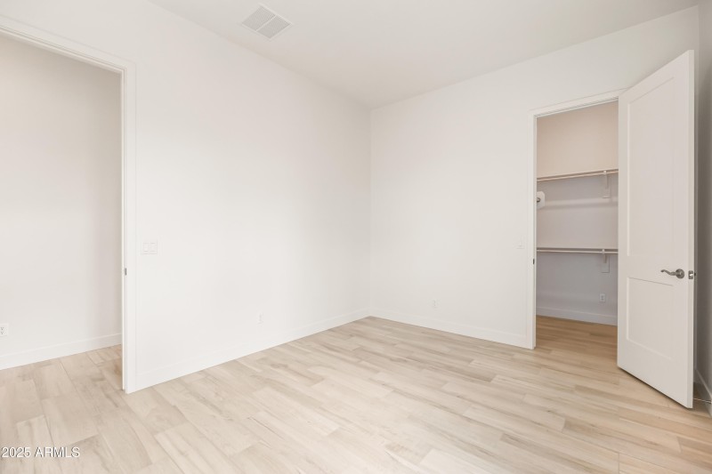 Secondary Bedroom's Walk-in Closet