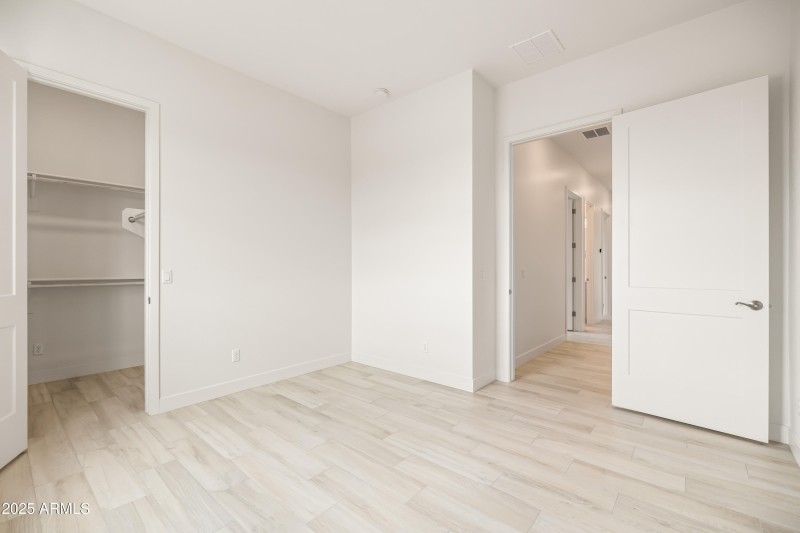 Secondary Bedroom's Walk-in Closet