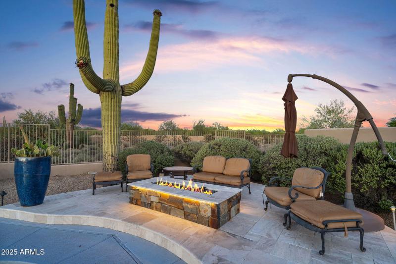 Large gas fire pit by pool