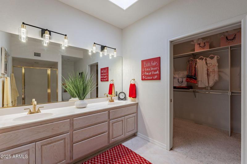 Walk in closet and main bathroom