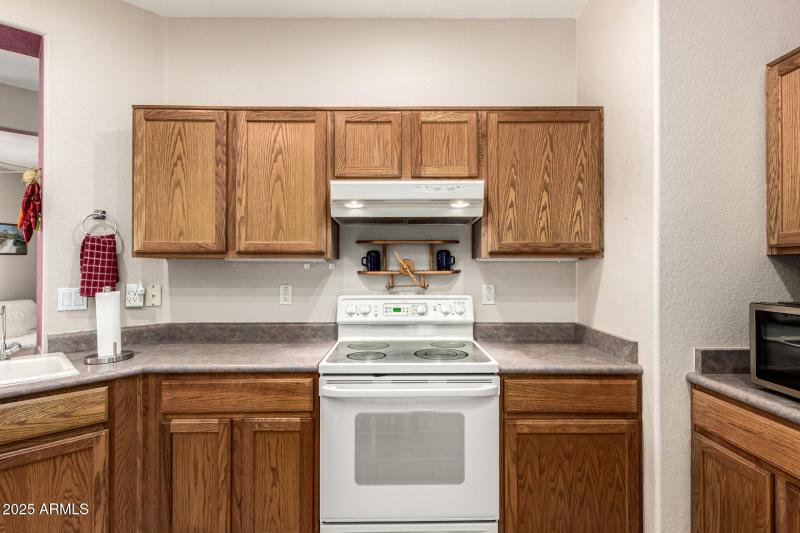Plenty of Oak Cabinets
