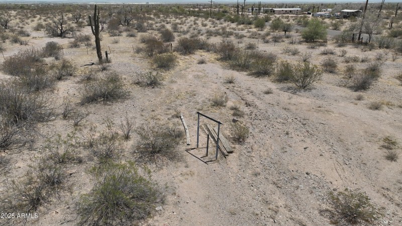 Ground view with partial fence