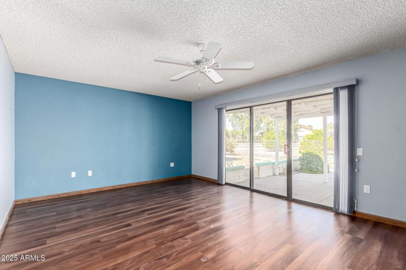 Primary Bedroom with Pool View