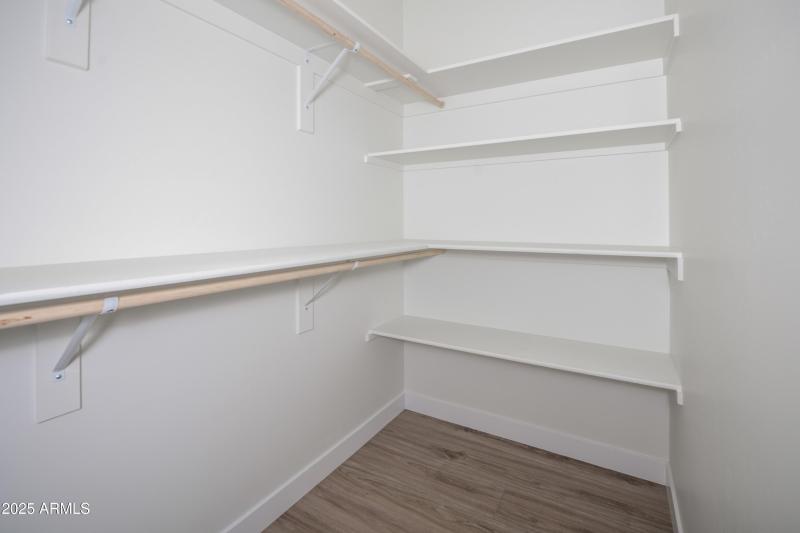 Guest Bedroom Closet (one in eac