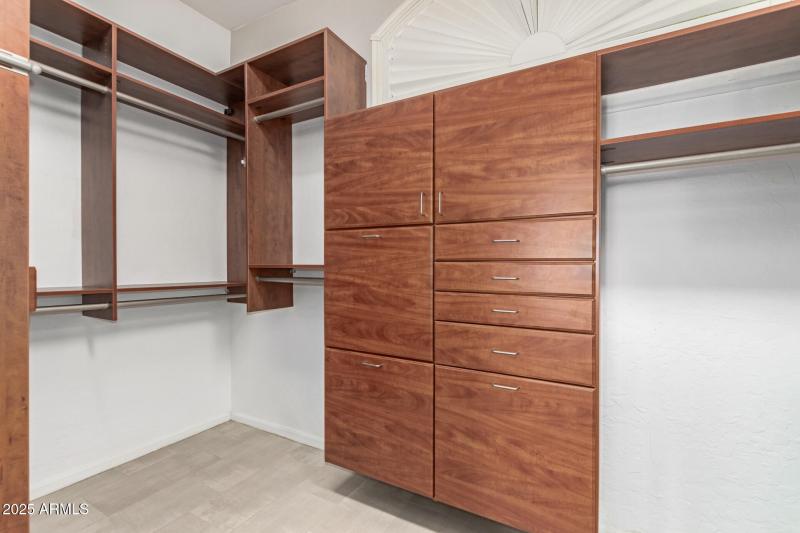 Primary Closet with Built-In Cabinetry