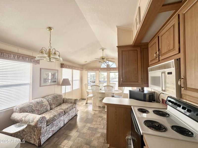 VIEW OF FRONT ROOM FROM KITCHEN