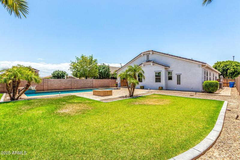 Lots of Grass and Gas Fire Pit