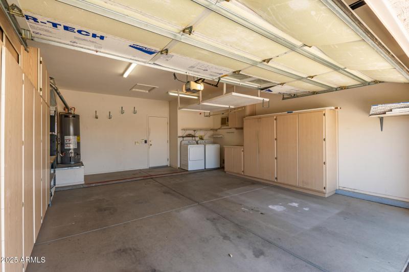Garage with built in cabinets