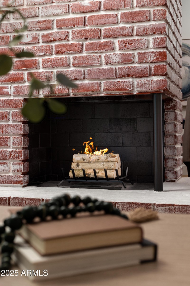 FEATURE RED BRICK FIREPLACE
