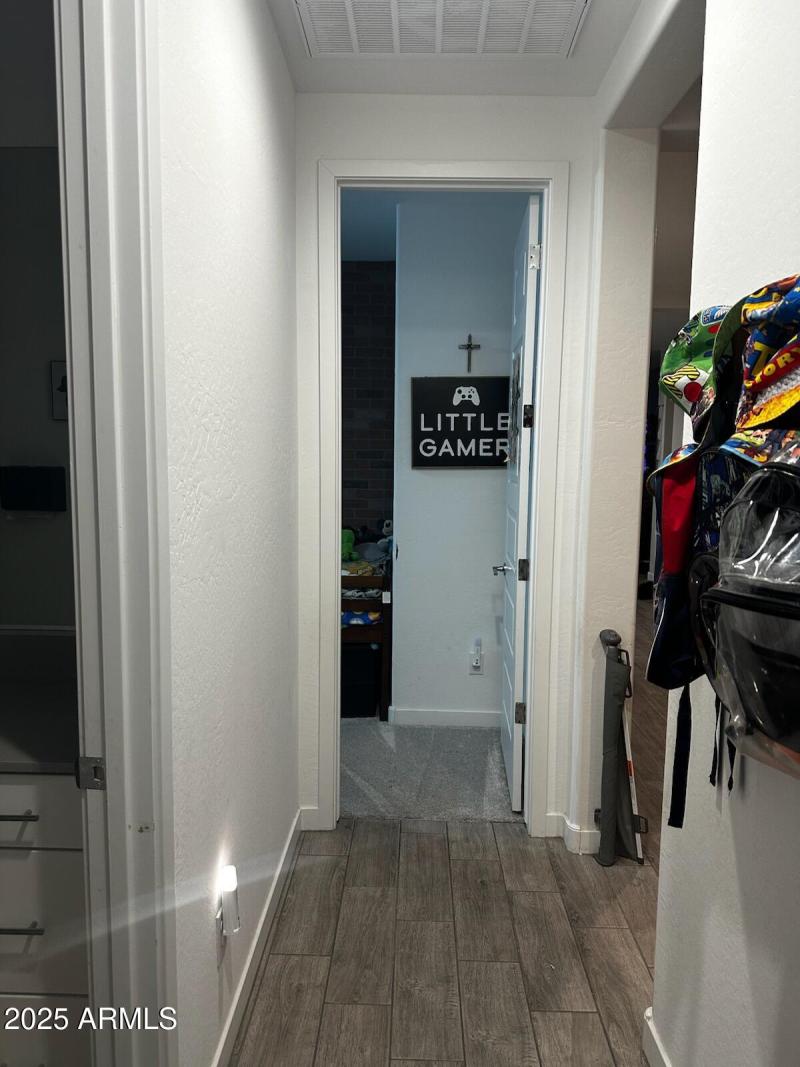 Hallway to secondary bedroom 1