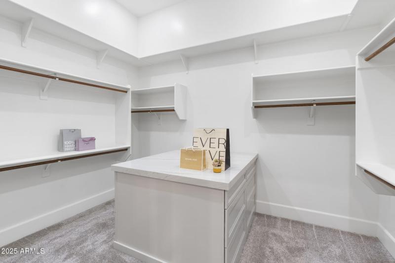 His and hers large walk ins