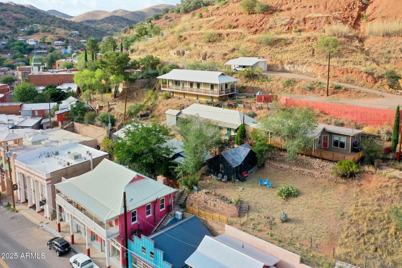 Drone Shot home in blue studio in black